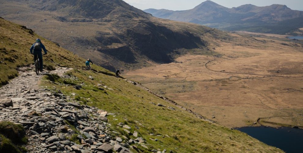 Mountain Bike Rider descending Snowdon using Rangers Path with Far Reaching Views