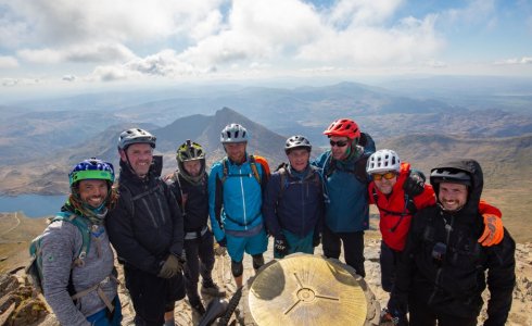 mountain bike riders at the top of Snowdon mountain