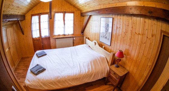 Double bed for Mum and Dad family summer holiday alps